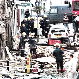 Day 1, rescue services amongst rubble after the Omagh bomb